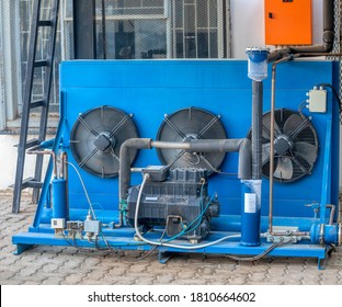 Industrial Blue Refrigeration Unit From An  Aircon Outdoors