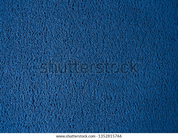 Industrial\
blue vinyl carpet Coil Pattern Car Floor Mat texture. Close up anti\
slippery surface vinyl dust background\
image.