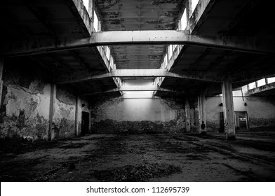 Industrial building interior in dark colors - Shutterstock ID 112695739