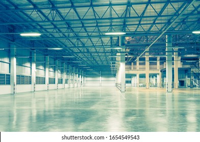 Industrial Building Or Modern Factory For Manufacturing Production Plant Or Large Warehouse, Polished Concrete Floor Clean Condition And Space For Industry Product Display Or Industry Background.