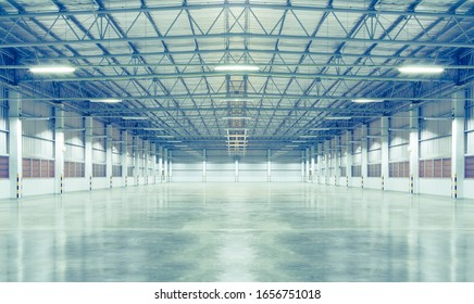 Industrial Building Or Modern Factory For Manufacturing Production Plant Or Large Warehouse, Polished Concrete Floor Clean Condition And Space For Industry Product Display Or Industry Background.