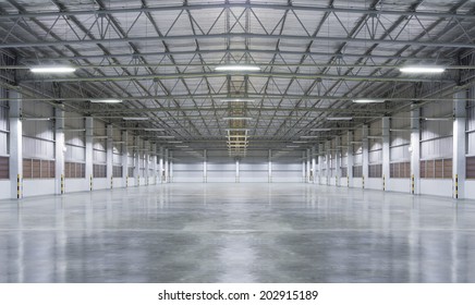 Industrial Building Or Modern Factory For Manufacturing Production Plant Or Large Warehouse, Polished Concrete Floor Clean Condition And Space For Industry Product Display Or Industry Background.