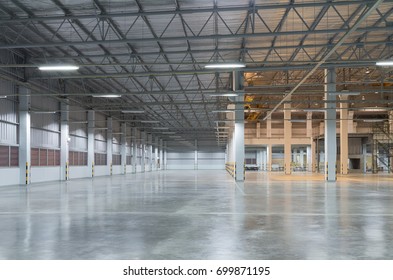 Industrial Building Or Modern Factory For Manufacturing Production Plant Or Large Warehouse, Polished Concrete Floor Clean Condition And Space For Industry Product Display Or Industry Background.