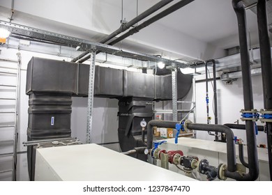 Industrial Building Ventilation System With Bog Steel Pipes In Control Room