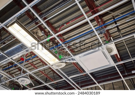 Industrial Ceiling Infrastructure with Translucent Panels Upward Perspective