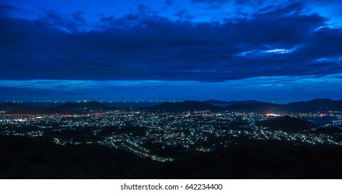 Industrial City In Night Time