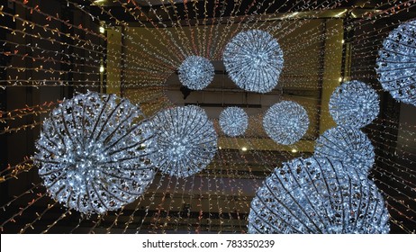 Industrial Climber Sets Up Christmas Decorations In The Shopping Centre