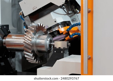 Industrial CNC gear grinding machine close up. Selective focus. - Powered by Shutterstock