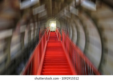 Industrial color background with red staircase from inside one tube. Motion blur filter applied. - Powered by Shutterstock