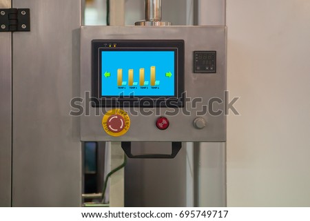 Industrial Color touchscreen use control machine in factory, HMI technology for industry, Touchscreen with tred bargraph and control panel, Industrial concept