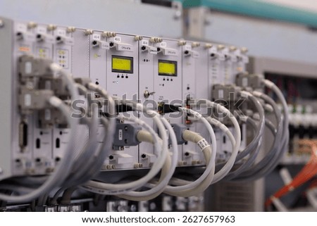 Industrial computer control system mounted in rack. Selective focus.