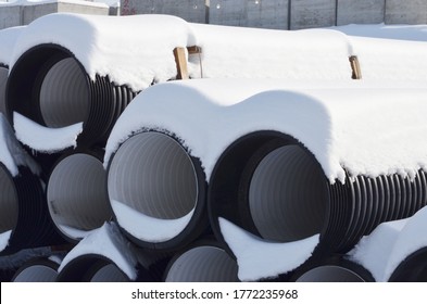 industrial construction pipe under the snow