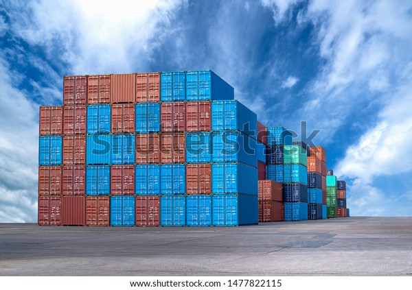 Industrial\
Containers box from Cargo freight ship for import and export in\
shipping yard with cargo container\
stack.