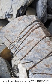 Industrial Cut Of Stone Blocks In A Quarry. Stone Processing Or Geology.