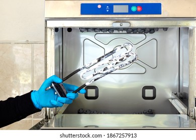 Industrial Dish Washer And Broken Turbular Electric Heating Because Of Over Calcification. Periodic Equipment  Maintenance Concept.