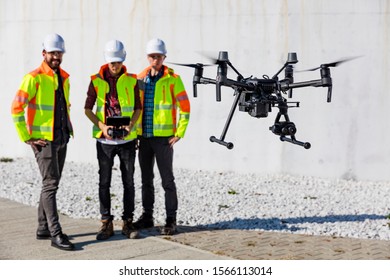 Industrial drone operators on work site
