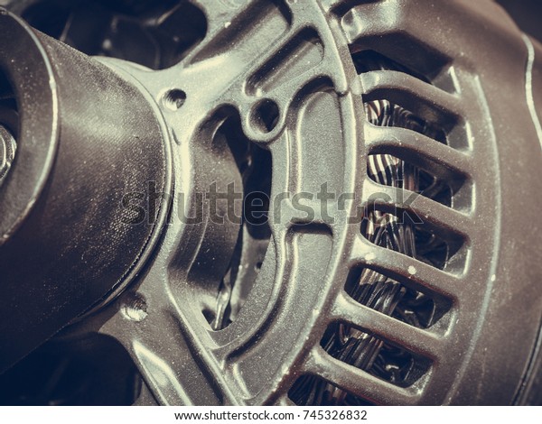 Industrial electric\
auto motor concept. Detailed closeup of cross section in alternator\
generator machine\
engine