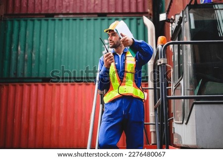 Industrial engineer worker working at overseas shipping container yard