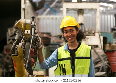 Industrial Engineers in Hard Hats.Work at the Heavy Industry Manufacturing Factory.industrial worker indoors in factory. man working in an industrial factory. - Powered by Shutterstock