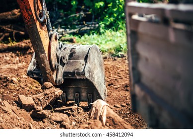industrial excavator scoop, close-up of heavy machinery with metal bucket