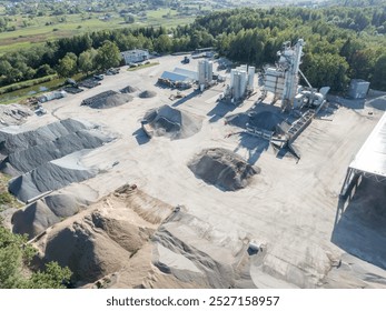 Industrial Facility with Extensive Sand and Gravel Storage and Machinery. Top view of industry manufactory - Powered by Shutterstock