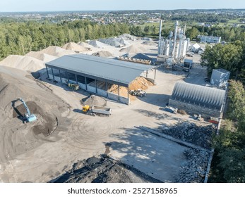 Industrial Facility with Extensive Sand and Gravel Storage and Machinery. Top view of industry manufactory - Powered by Shutterstock