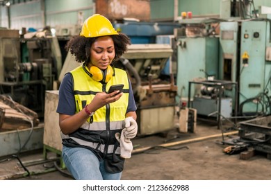 Industrial factory concept. Engineering working on mobile phone. Worker operating and maintenance of machinery. - Powered by Shutterstock