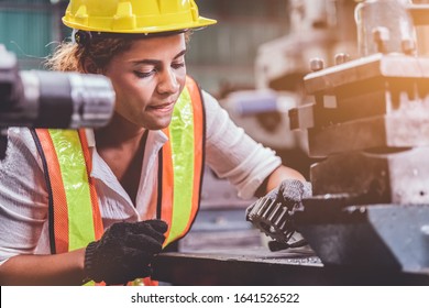 Industrial factory maintenance engineers woman inspect relay protection system of machinery with copy space for your text. Industry, Maintenance, Engineering and construction concept. - Shutterstock ID 1641526522