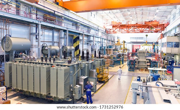 industrial\
factory in mechanical engineering for the manufacture of\
transformers - interior of a production hall\
