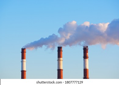 Industrial factory. Smokestacks of the factory. Ecology