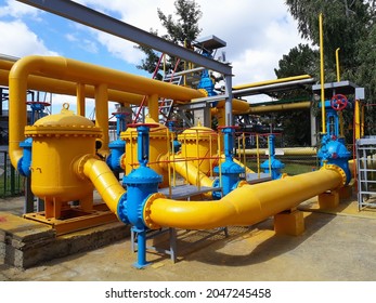 Industrial Gas Distribution Pipeline Station, Yellow Pipes, Tubes, Valve And Other Equipment