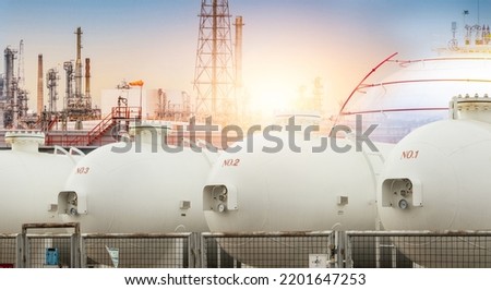 Industrial gas storage tank. LNG or liquefied natural gas storage tank. Energy price crisis. Gas tank in petroleum refinery. Energy crisis. Natural gas storage industry and global market consumption.