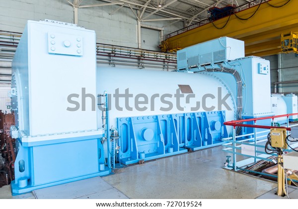 industrial generator in the Engine\
Room for Steam Turbines of the Kursk Nuclear Power\
Plant