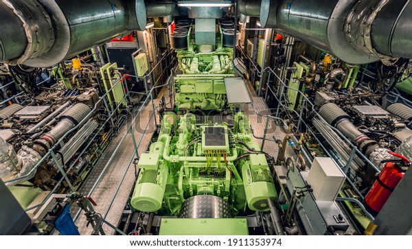 Industrial green ship\'s engine\
room
