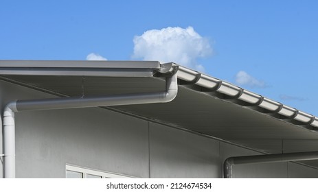 Industrial half round gutter and downpipe