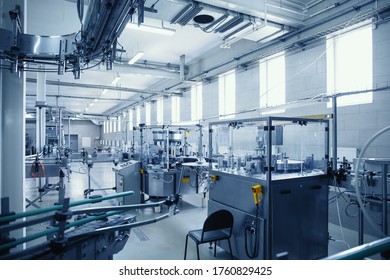 Industrial Interior Of Beverage Factory, Blue Toned. Food And Drink Production Manufacturing.