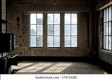 Industrial interior with br light from the windows