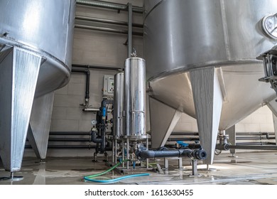 Industrial Interior Of Water Plant Production. Large Steel Tanks For Filtering And Potable Water Treatment. Industry Background.