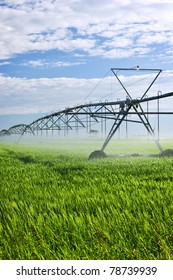 Industrial Irrigation Equipment On Farm Field In Saskatchewan, Canada