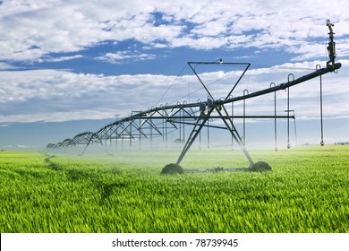 Industrial Irrigation Equipment On Farm Field In Saskatchewan, Canada