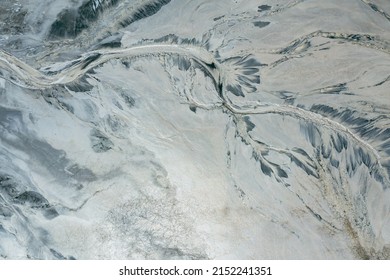 Industrial Landscape. Aerial View. Dry Surface. Desertic Landscape. Human Impact On The Environment. View From Above. Abstract Industrial Background. 