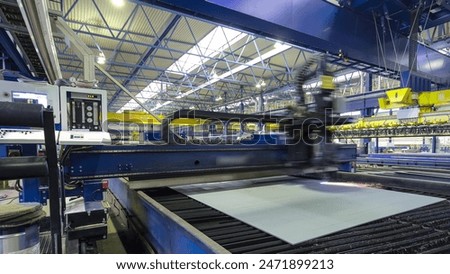 Industrial Laser cutting processing timelapse hyperlapse manufacture technology of flat sheet metal steel material with spark. Automated machine for precise metal cutting. Plasma cuts steel
