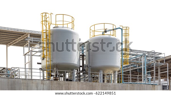 Industrial liquefied petroleum gas storage tank\
with pipeline isolated on\
white