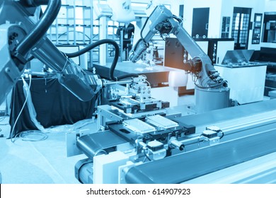industrial machine and factory robot arm,Smart factory industry 4.0 concept.