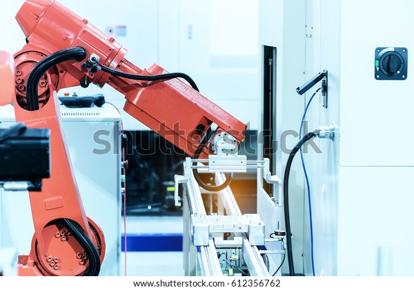 industrial machine and factory robot arm,Smart\
factory industry 4.0\
concept.