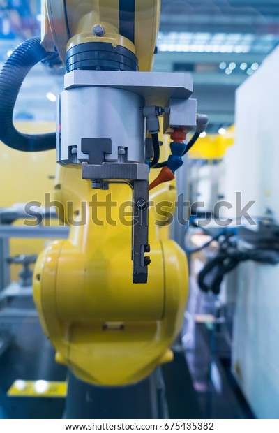 industrial machine and factory robot arm,Smart
factory industry 4.0
concept.