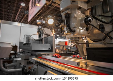 Industrial machines working for the weak humans in a factory