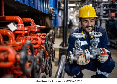 Industrial Maintenance Service And Experienced Engineer Changing Pipe Valves In Oil Refinery Plant.