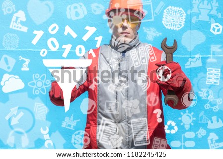 Industrial man clicks a funnel with filtering numbers zero one and offers a spanner. Digital Data Filter Industry Digitilization concept. Manufacture Structuring Information.