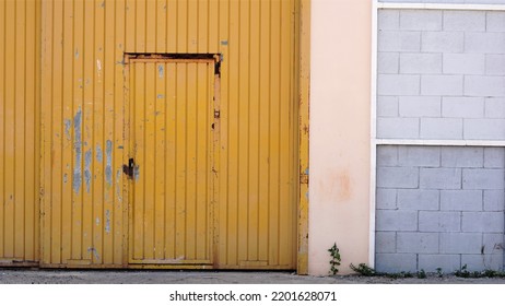 Industrial Metal Door On The Facade